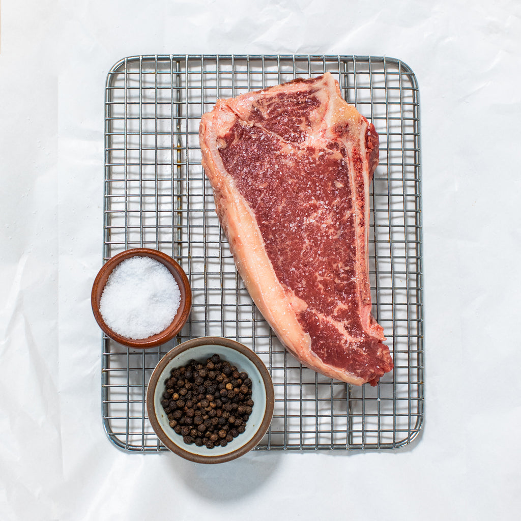 Dry Aged Bone In Strip Steak - The Butcher Shoppe