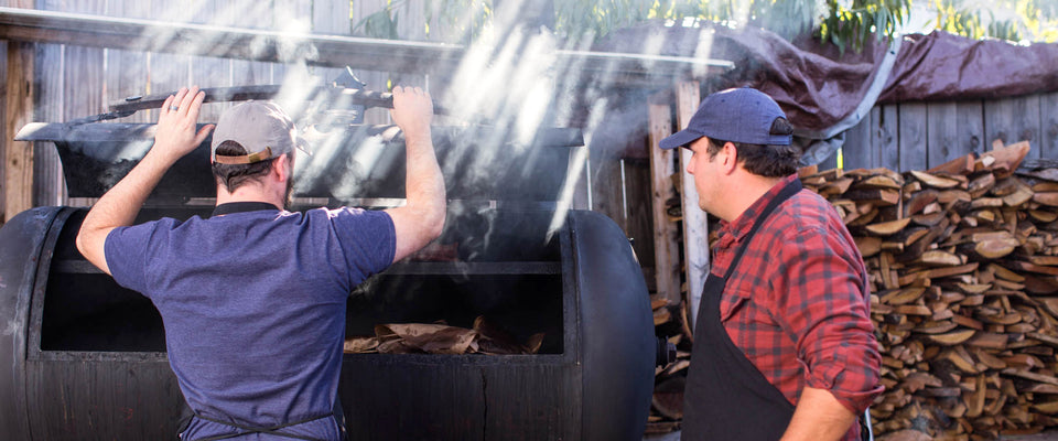 Chris and James opening the smoker