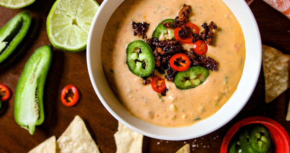 Chorizo queso topped with chorizo and peppers