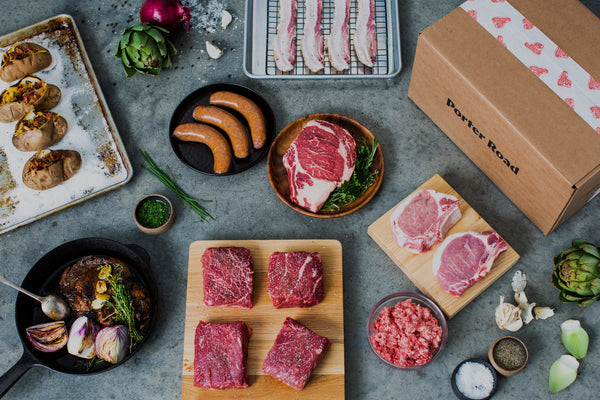 Meat cuts and Porter Road box overhead view